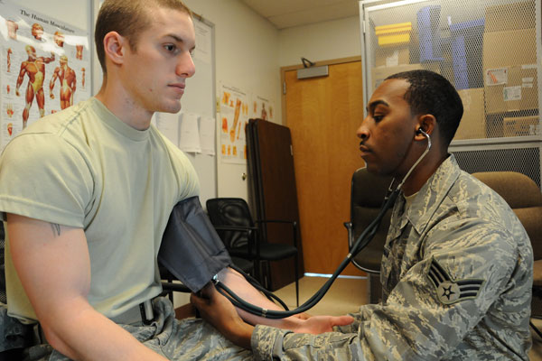 How can you find out if an urgent care facility accepts Tricare?