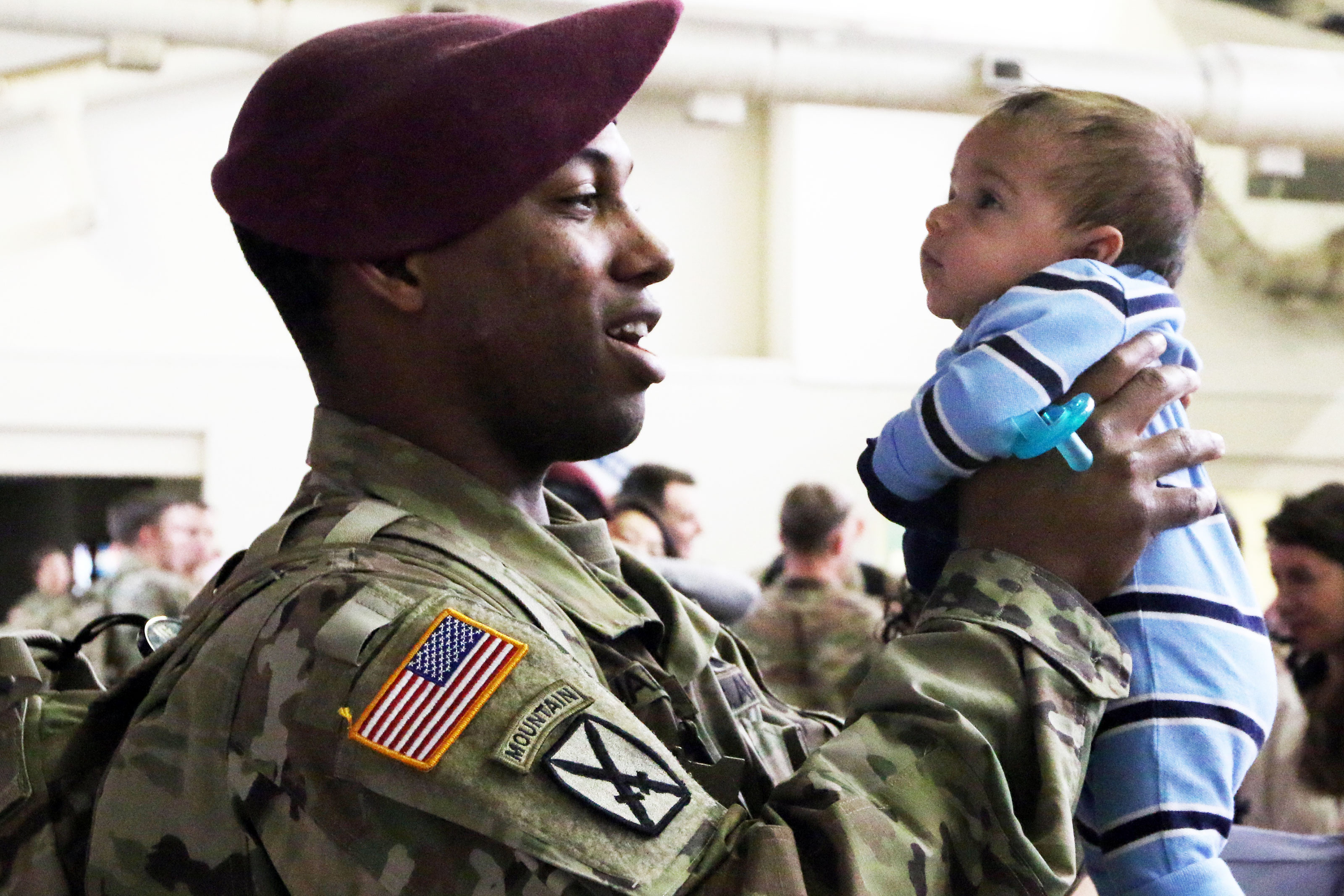 Families and friends reunite with Paratroopers from 1st Brigade Combat Team, 82nd Airborne Division, Mar. 19th at Pope Army Airfield on Fort Bragg, N.C. (U.S. Army/Sarah Goss)