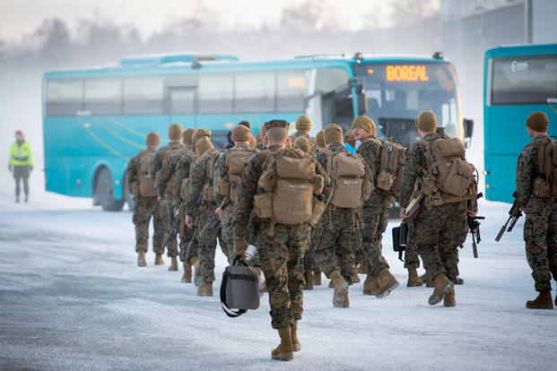 U.S. Marines with Black Sea Rotational Force 17.1 prepare to board a bus after arriving in Vaernes, Norway, Jan. 16, 2017. (U.S. Marine Corps photo/Sgt. Erik Estrada)