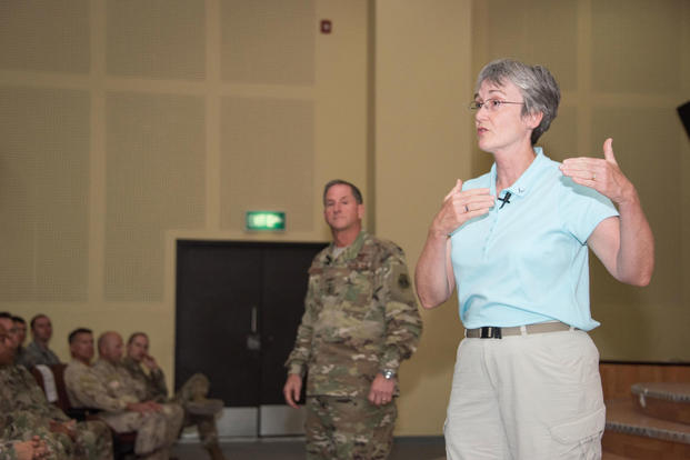 Secretary of the Air Force Heather Wilson, right, and Air Force Chief of Staff David L. Goldfein, center, speak with 386th Air Expeditionary Wing Airmen and joint coalition partners during a town hall event held at the base theater, Aug. 20, 2017, in an undisclosed location in Southwest Asia. (U.S. Air Force photo/Jonathan Hehnly)