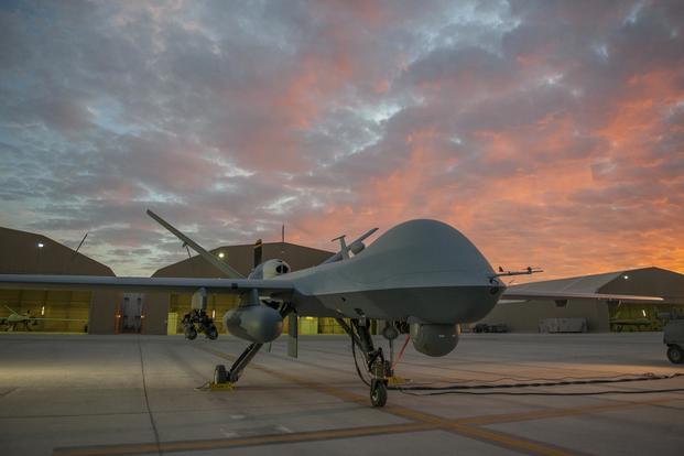 An MQ-9 Reaper equipped with an extended range modification from the 62nd Expeditionary Reconnaissance Squadron sits on the ramp at Kandahar Airfield, Afghanistan, Dec. 6, 2015. (U.S. Air Force/Tech. Sgt. Robert Cloys)
