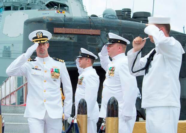 Cmdr. Travis W. Zettel, commanding officer of the Los Angeles-class fast-attack submarine USS Bremerton (SSN 698), salutes sideboys during a change of command ceremony on Joint Base Pearl Harbor-Hickam. (Michael H. Lee/U.S. Navy)
