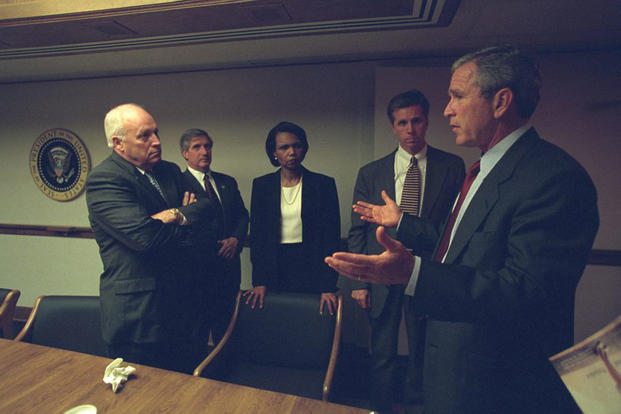 President George W. Bush talks with Vice President Dick Cheney, National Security Advisor Condoleezza Rice and other advisors during meetings at the President’s Emergency Operations Center, Sept. 11, 2001. (National Archives)