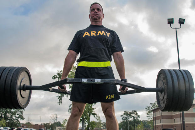 A TRADOC senior leader participates in the strength deadlift, during an exhibition of the new Army Combat Fitness Test Aug. 1, 2018 at Fort Eustis, Va. (U.S. Army photo/Tristan Biese)