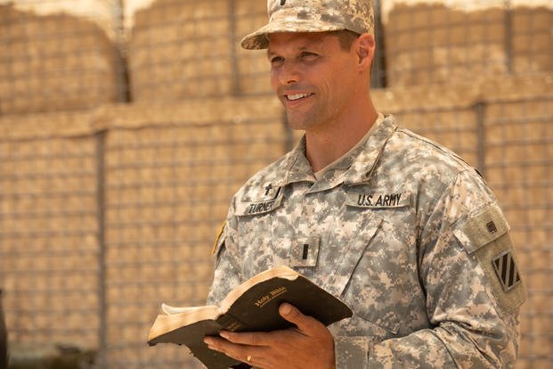 Chaplain Darren Turner (Justin Bruening) shares words of encouragement with his troops before heading out on patrol in "Indivisible." (Photo courtesy of © 2018 Provident Films LLC and The WTA Group, LLC.)
