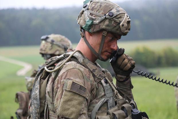 A soldier with 4th Battalion, 319th Field Artillery Regiment, 173rd Infantry Brigade Combat Team (Airborne), communicates over the radio during Saber Junction 18 at the U.S. Army’s Joint Multinational Readiness Center in Hohenfels, Germany, on Sept. 23 , 2018. A new product might reduce troops' load by reducing the need for batteries. (U.S. Army photo by Spc. Dhy’Nysha Shaw)
