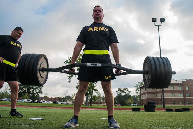A U.S. Army Training and Doctrine Command senior leader participates in the strength deadlift during an exhibition of the new Army Combat Fitness Test at Joint Base Langley-Eustis, Va., Aug. 1, 2018. (U.S. Air Force/Senior Airman Tristan Biese)