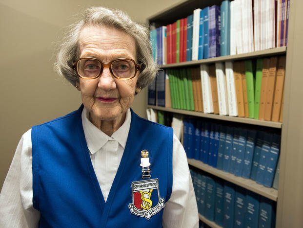 Helen Wells, a 94-year-old assistant library volunteer for the 59th Medical Wing, poses for a photo. (U.S. Air Force/Kevin Iinuma)