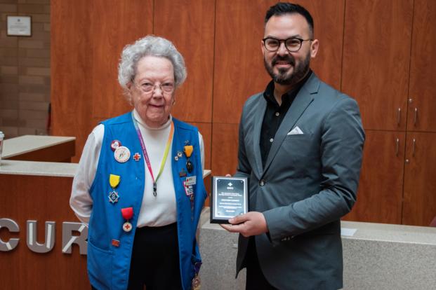 Michael Vela, executive director, San Antonio Red Cross Chapter, presents Gretchen Barrett with the Clara Barton Legacy Award for outstanding leadership and volunteerism during a ceremony March 7, 2019 at Brooke Army Medical Center. The 92-year-old began volunteering in 1958 in Stuttgart, Germany and continued her volunteer career in San Antonio in 1969 at the Beach Pavilion on Fort Sam Houston. (U.S. Army photo by Jason W. Edwards)