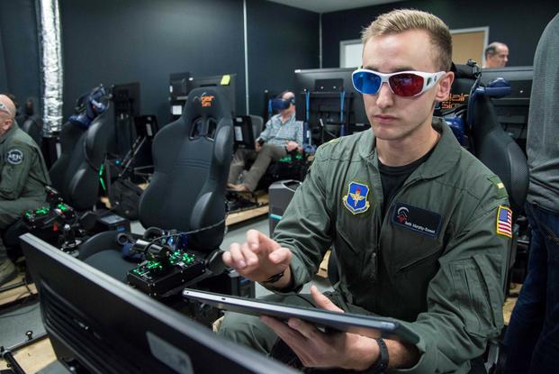U.S. Air Force 2nd Lt. Seth Murphy takes a 3D vision test prior to virtual reality flying training at Austin-Bergstrom International Airport in Austin, Texas, Feb. 5, 2019. (Sean M. Worrell/U.S. Air Force)