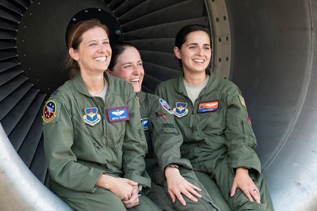U.S. Air Force Capt. Rebecca Gooch (left), a KC-135 Stratotanker instructor pilot assigned to the 54th Air Refueling Squadron at Altus Air Force Base, Oklahoma, Master Sgt. Samantha Converse, a KC-135 instructor/evaluator boom operator assigned to the 54th ARS at Altus AFB, and Maj. Alexandra Traña, a KC-135 instructor pilot assigned to the 54th ARS at Altus AFB pose for a photo, Sept. 18, 2019, at the Alliance Airfield, Fort Worth, Texas. This year and for the first time, the Mighty 97th sent its own all-w