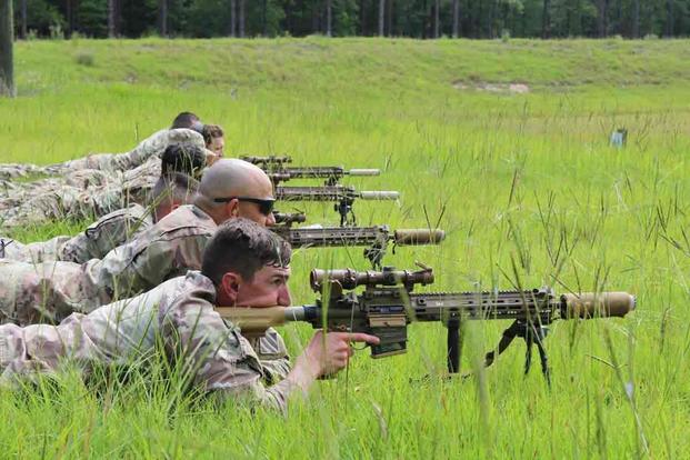 Soldiers fire the U.S. Army’s M110A1 Squad Designated Marksman Rifle at a sniper range on Fort Stewart.