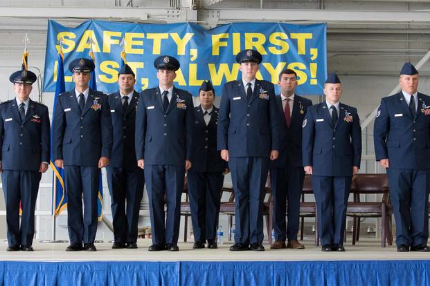 The crew of Shadow 71 pose after receiving the Distinguished Flying Cross.