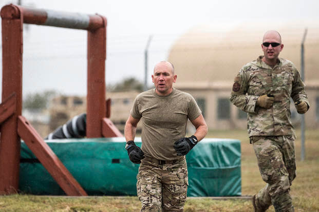 Special warfare recruiters run an obstacle course.