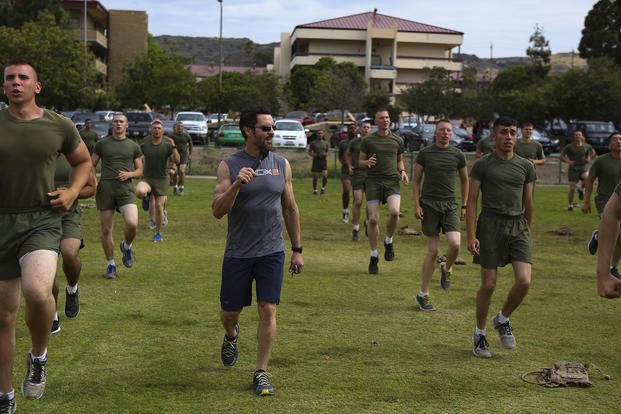 Fitness enthusiast Tony Horton works with Marines at Camp Pendleton.