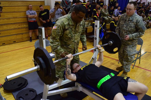 A soldier competes in the bench press event at Fort Stewart.