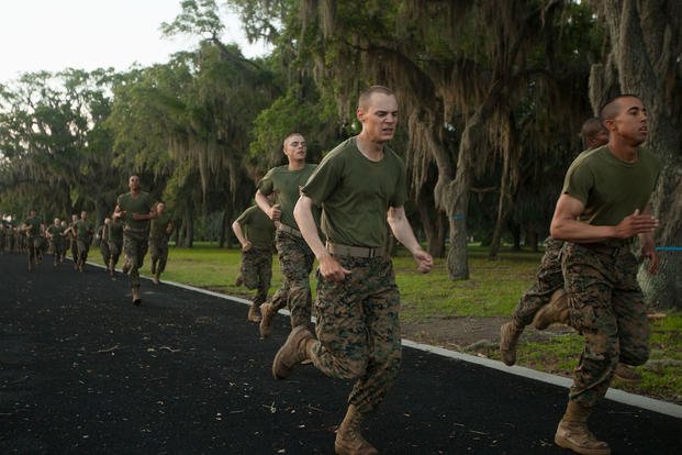 Marine recruits run 880 yards as part of a combat fitness test on Parris Island.