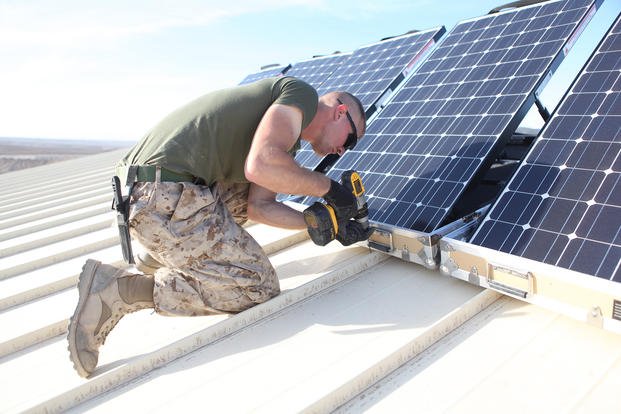 New solar panels are installed on Combat Outpost Shukvani, Helmand province, Afghanistan.