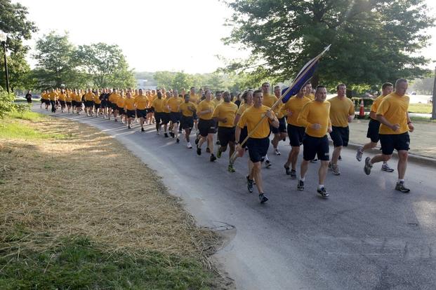 U.S. Navy sailors stationed at Fort George G. Meade, Md., take part in a resiliency run, May 18, 2012.