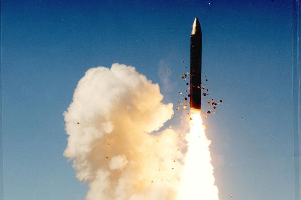 A Peacekeeper missile is launched during a test at Vandenberg Air Force Base, California, in 1990.