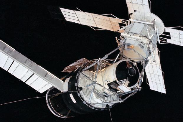 A close-up view of the Skylab space station cluster photographed against a black sky (NASA).