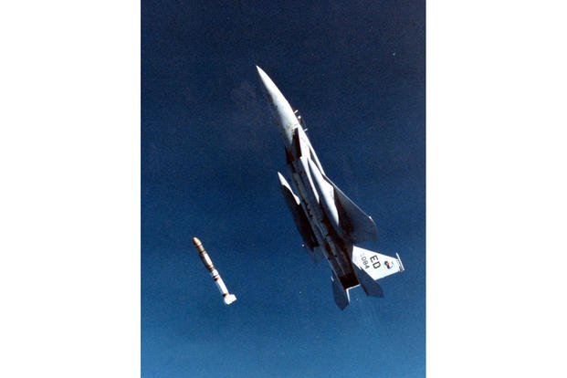 A F-15 fighter jet piloted by then-Maj. Wilbert 'Doug' Pearson Jr. flies an ASM-135 anti-satellite missile.