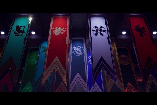 The front four banners are the active clans that the player interacts with the most. They start as a pilot for the Smoke Jaguars, the second red banner. In the expansion, the player acts as a member of Ghost Bear, the white banner. (Photo by Logan Nye) The front four banners are the active clans that the player interacts with the most. They start as a pilot for the Smoke Jaguars, the second red banner. In the expansion, the player acts as a member of Ghost Bear, the white banner.