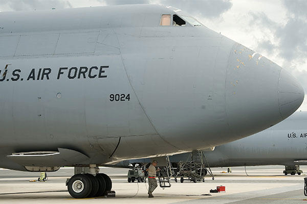 A C-5M Super Galaxy is parked on the flightline at Dover Air Force Base, Del. (U.S. Air Force photo/Adrian Rowan)