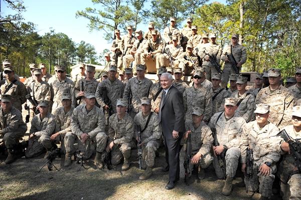 Defense Secretary Robert M. Gates visits Marines stationed at Camp Lejeune, N.C., in April 2009. Many veterans who served   there have filed disability claims with VA because the camp's water supply contained toxins. (US Air Force/Jerry Morrison)