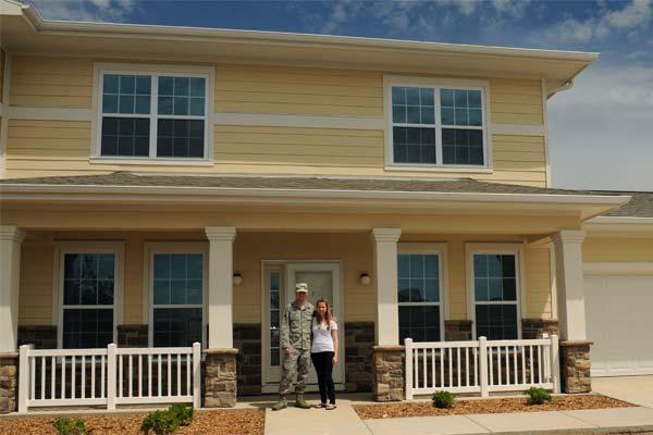 Senior Airman Dustin Monti and his spouse, Beth, are the first family to move into the newest privatized housing development at Ellsworth Air Force Base, S.D., May 27, 2015. (U.S. Air Force photo by Senior Airman Hailey R. Staker/Released)