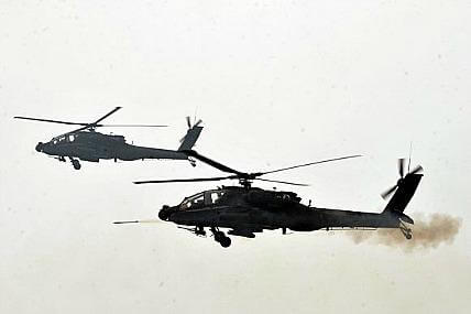 Army Apache helicopters participate in exercise to mark Korean War anniversary