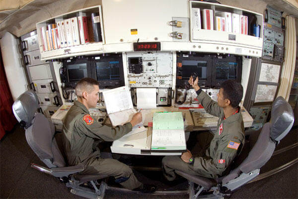 FILE PHOTO - In the underground launch control center at Minot Air Force Base's Missile Alert Facility B-1. The missile combat crew are on duty for 24 hours, able to monitor and launch Minuteman III missiles if directed. (U.S. Air Force photo/Master Sgt. 