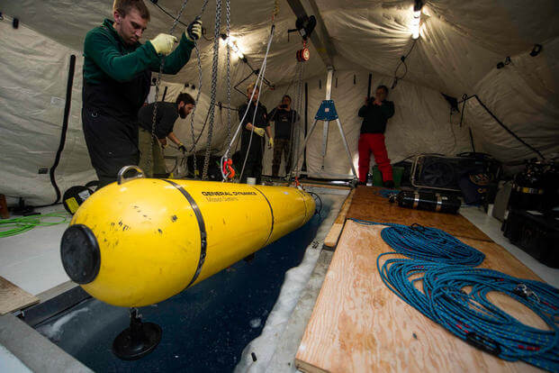 Students with MIT deploy the MACRURA Unmanned Underwater Vehicle during Ice Exercise (ICEX) 2016. (Photo: Mass Communication Specialist 2nd Class Tyler Thompson)
