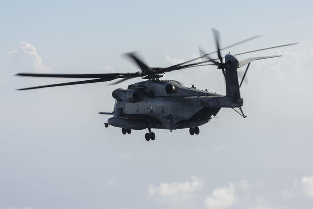 A CH-53 Super Stallion with Marine Heavy Helicopter Squadron 462, 3rd Marine Aircraft Wing, forward conducts a flight off the coast of Okinawa, Japan, July 31, 2017. (U.S. Marine Corps photo/Christian J. Robertson)
