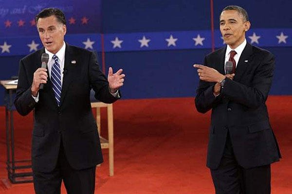 President Barack Obama and Republican presidential nominee Mitt Romney exchange views during the second presidential debate at Hofstra University, Tuesday, Oct. 16, 2012.