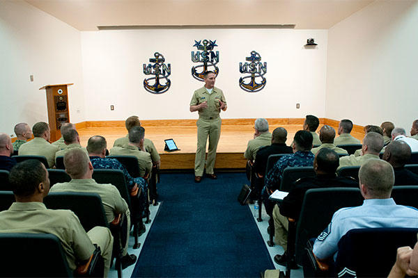 Master Chief Petty Officer of the Navy Mike Stevens speaks with service membersat the Senior Enlisted Academy. (U.S. Navy photo by Mass Communication Specialist 2nd Class Martin L. Carey.)