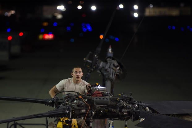 Airman Joshua Herron, a 41st Expeditionary Helicopter Maintenance Unit HH-60 Pave Hawk crew chief, completes a 50-hour inspection on a Pave Hawk at Bagram Airfield, Afghanistan, June 28, 2015. (U.S. Air Force photo/Tech. Sgt. Joseph Swafford)