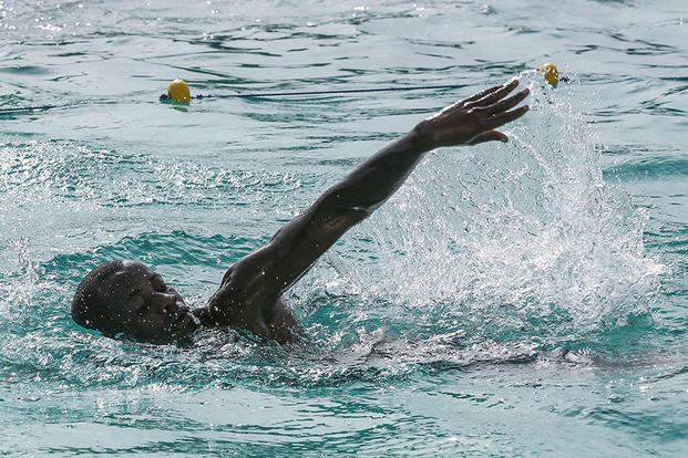 A Compagnie Fusilier de Marin Commando demonstrates his swimming technique during a swim assessment by personnel with Special-Purpose Marine Air-Ground Task Force Crisis Response-Africa, in Dakar, Senegal, Aug. 28, 2015. Photo By: Cpl. Olivia McDonald