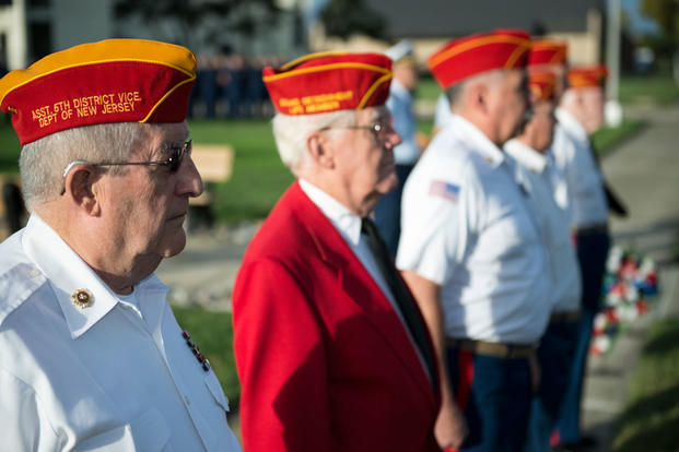 Members of the Marine Corps League Dramis Detachment stand at attention during morning colors on board the Coast Guard Training Center Cape May, Sunday, Sept. 27, 2015. (Photo by Chief Warrant Officer John Edwards)