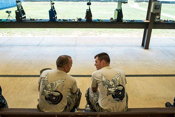 Second Lt. Tucker Sears (right), a 436th Logistics Readiness Squadron material management officer in charge, and his brother, Staff Sgt. Terrence Sears, the Air Force National Pistol Team NCO in charge. (U.S. Air Force/Staff Sgt. Andrew Lee)