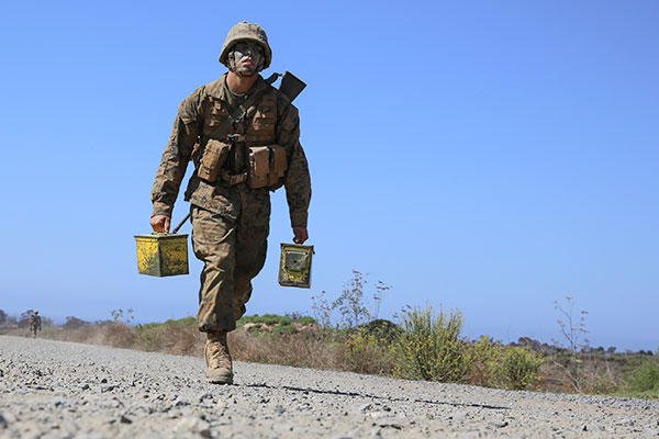 Marine Corps Pfc. Mason A. Davis sprints approximately 100 yards with two ammunition cans during the 12 Stalls event at Edson Range, Marine Corps Base Camp Pendleton, Sept. 23, 2015. (U.S. Marine Corps/Cpl. Jericho Crutcher)