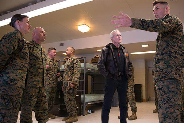 Secretary of the Navy Ray Mabus is given an overview of a squad bay at Officer Candidate School during his visit to Marine Corps Base Quantico, Virginia, Jan. 27, 2016. (U.S. Marine Corps/Sgt. Cuong Le)