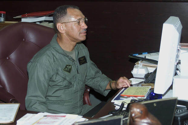 Charles “Charlie” Bolden, the 12th Administrator of NASA works at his desk at an unknown location and date. (Photo: U.S. Marine Corps)