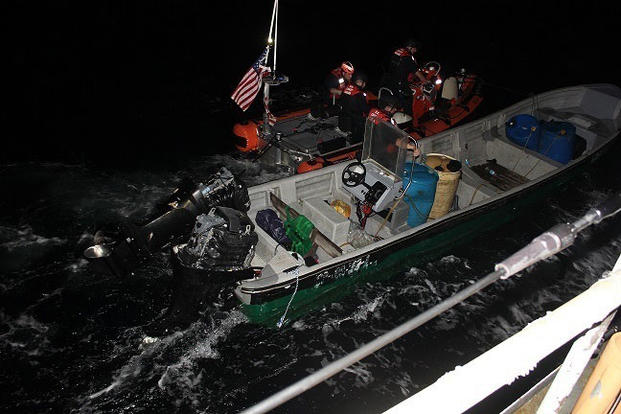 Coast Guard Cutter Escanaba's small boat crew tows an interdicted vessel during a patrol of the Eastern Pacific Ocean. (U.S. Coast Guard Photo)
