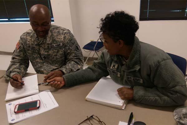 Sgt. 1st Class Alan McCoy and Staff Sgt. Tonya O'Connell interview each other during the Unit Public Affairs Representative training held in Seagoville, Texas, Nov. 30 - Dec. 1, 2015. (Photo: Staff Sgt. Kai L. Jensen)