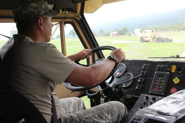 Pfc. Ronald Carstetter, motor transport operator, 1067th Transportation Co., drives the M1070 Heavy Equipment Transporter on an off-road course on Aug. 10, 2016 at Fort Indiantown Gap, Pa. (U.S. Army National Guard/Sgt. Jason Fetterolf)