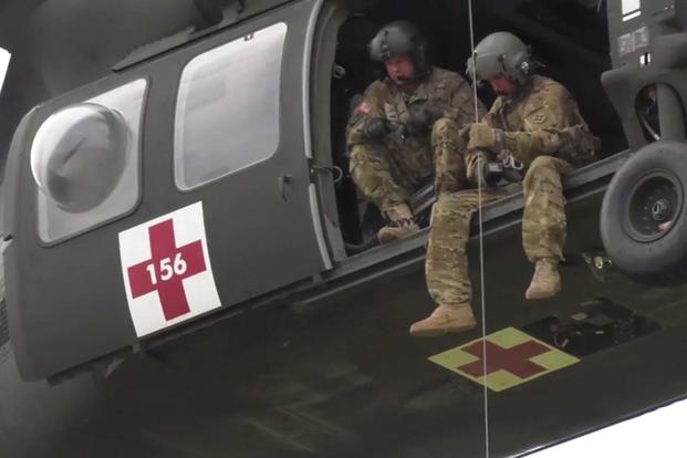 The Florida National Guard gets ready for Hurricane Irma. preparing high water vehicles and conducting hoist training with a UH-60 Black Hawk near Cecil Field, Jacksonville, FL. (Screen grab from Florida National Guard Video)