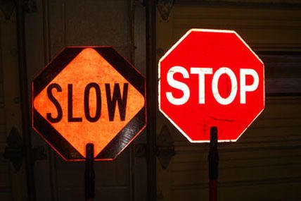 slow and stop signs
