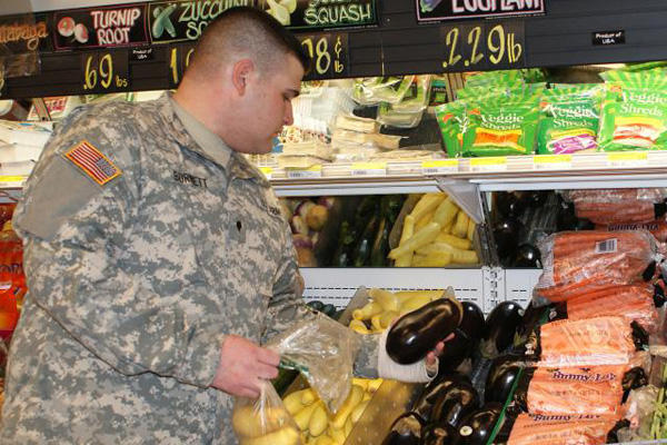 Soldier shopping at a commissary.