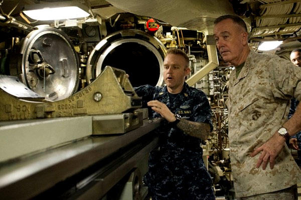 Marine Corps Gen. Joe Dunford, chairman of the Joint Chiefs of Staff, receives a briefing on the torpedo system on board the USS Alaska at Naval Submarine Base Kings Bay, Ga., on May 20. (DoD photo/D. Myles Cullen)